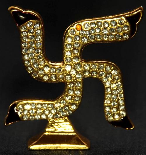 Jewel Studded Swastik Idol Figurine.