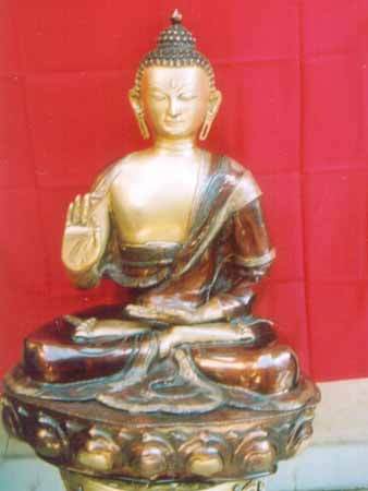Religious brass god figer