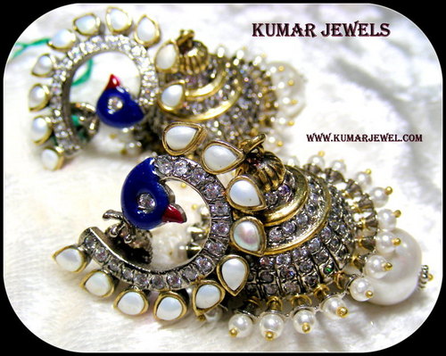 small peacock jhumki earrings.