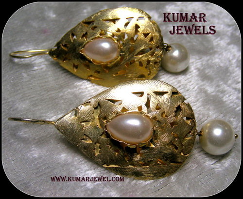 ethnic pearl earring.