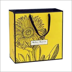 Paper Bag - Paper, 10x12x5 inches, Yellow | Eco-Friendly, Durable, Stylish, Customizable, Lightweight, Floral Print, Black Handles