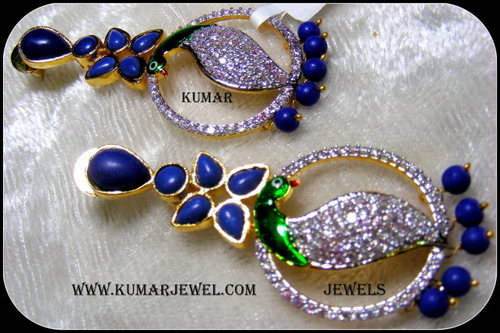 smilling peacock earrings.