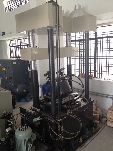 Hydraulic Button Press