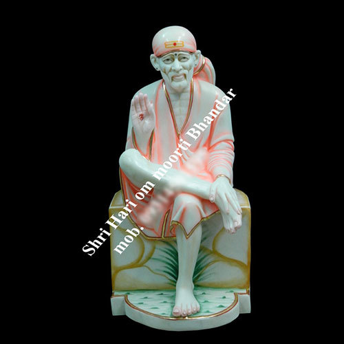 Polishing And Painting Sai Baba Statue