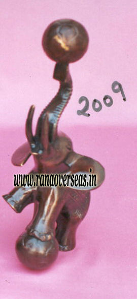 Copper Brown Brass Elephant Playing With Two Balls.