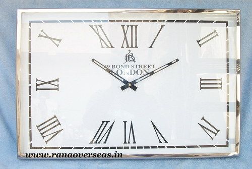 Silver And White Wall Hanging Steel Clock In 24 X 12 Inches.