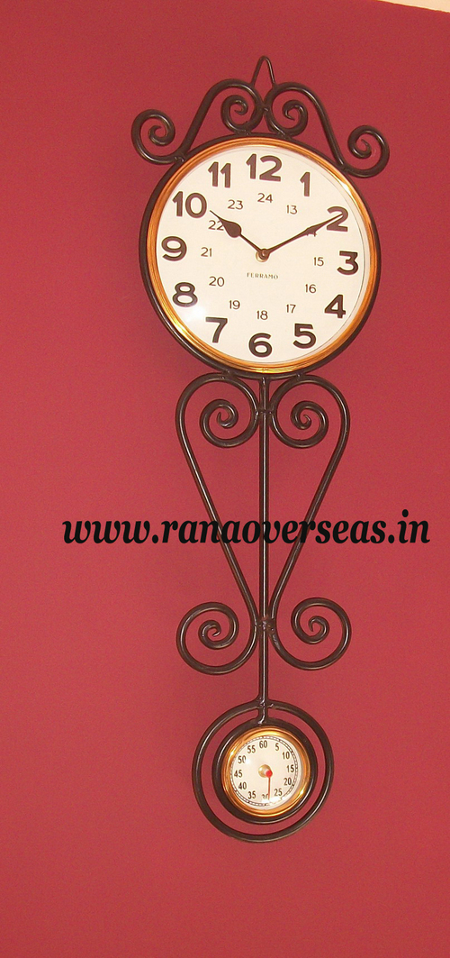 Brown And White Wall Hanging Rod Iron Clock.