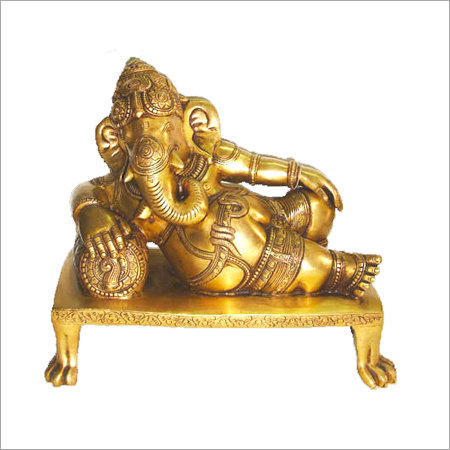 God Ganesh lying on pillow