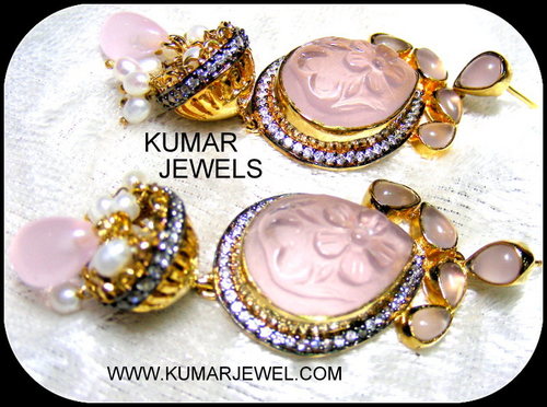 pink earrings.