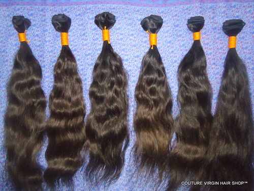 Virgin natural curly machine weft