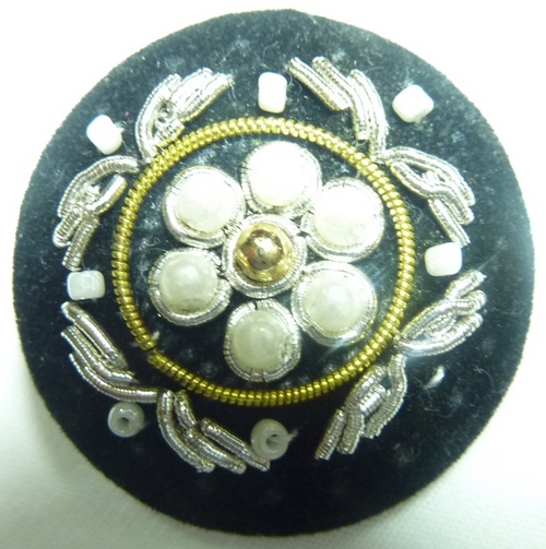 Crafted Metal Button