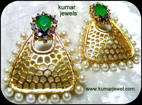 pearl earrings.