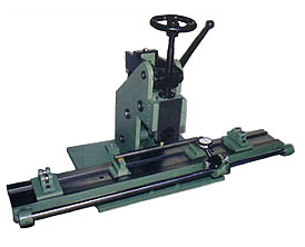 MANUAL OPERATED FLUTED ROLLER TRUNING MACHINE