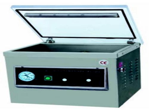 Table type single chamber packaging machine