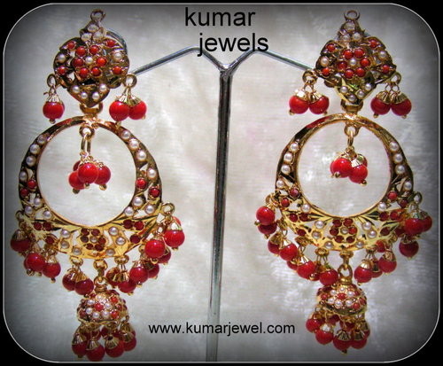 jadau coral earring.