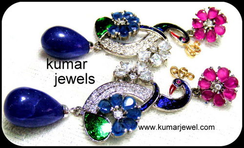 Designer peacock earring.