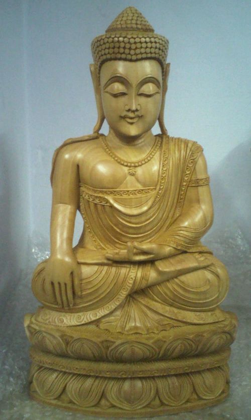 Wooden kamal budha in sitting