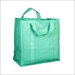 Non Woven Carry Bags - Non-Woven Polypropylene, Variable Dimensions, Green Color | Reusable, Durable, Eco-Friendly, Lightweight, Customizable, Water-Resistant, Strong Double Stitched Handles