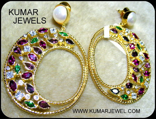 Circle stone earring.