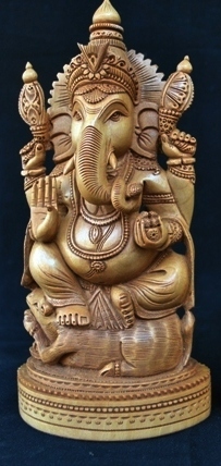 Wooden ganesh put on mouse
