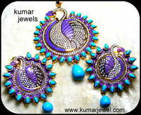 Designer peacock pendant set.