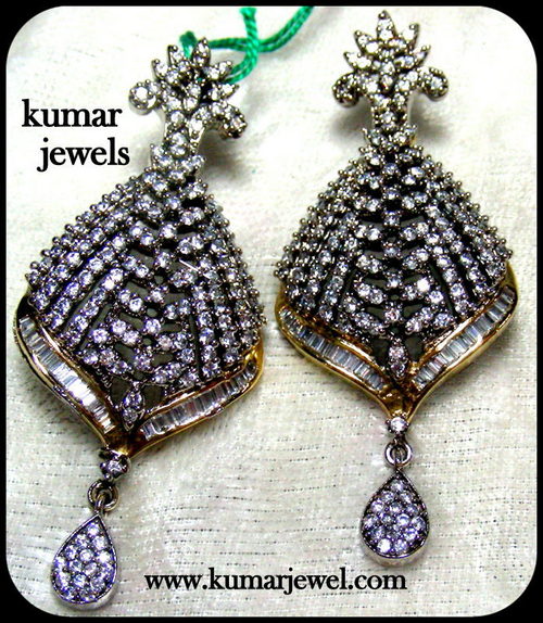 antique white earring.