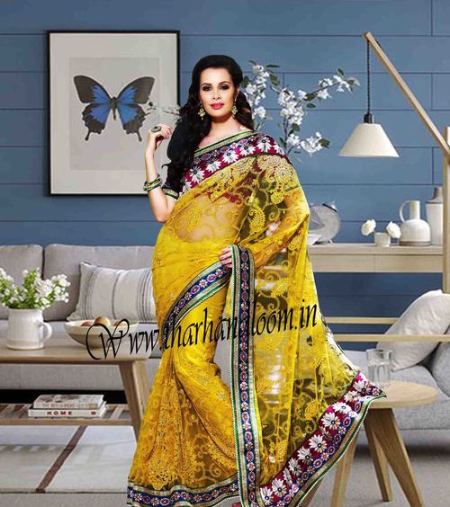 attractive yellow net saree