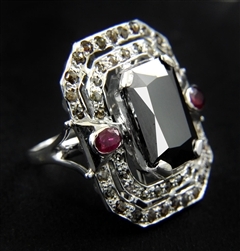 Large Radiant Cut 9.30 Ct. Black Diamond Solitaire Ring with Rubies