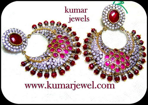 REDDISH EARRING.