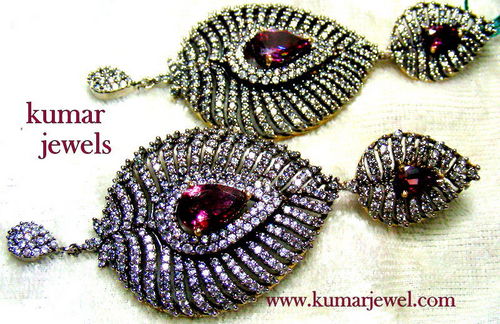THE CROWNING EARRING.