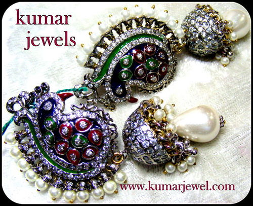 peacock style antique earring.