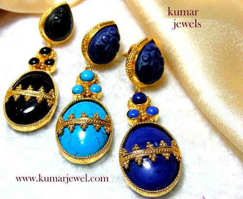 Costume carved earring.