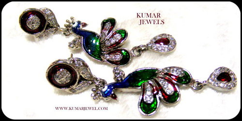 Enamel peacock earring.