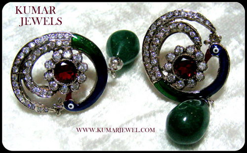 ROUND PEACOCK EARRING.