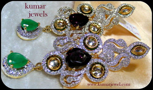 DIAMOND N KUNDAN TOUCH EARRINGS.