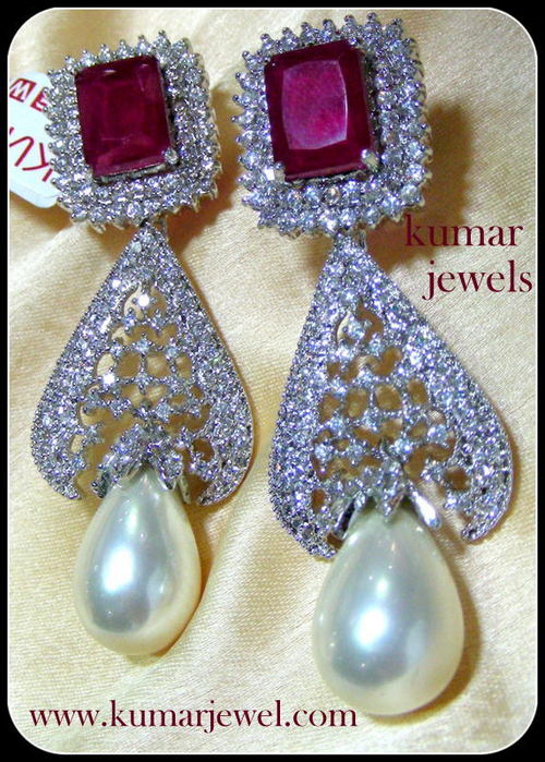 diamond style with pearl drop earring.