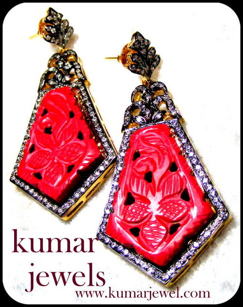 RED CARVED EARRINGS.