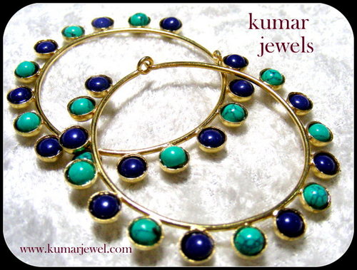 FASHION HOOP EARRINGS.