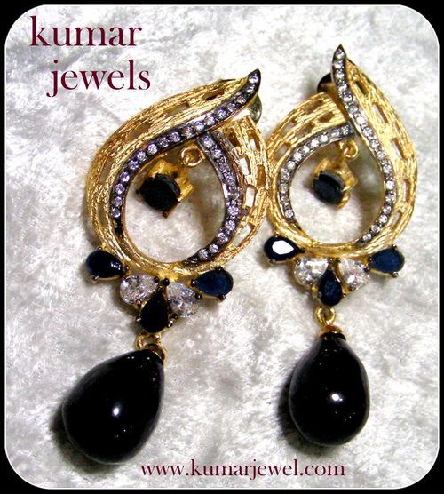 black drop earring.