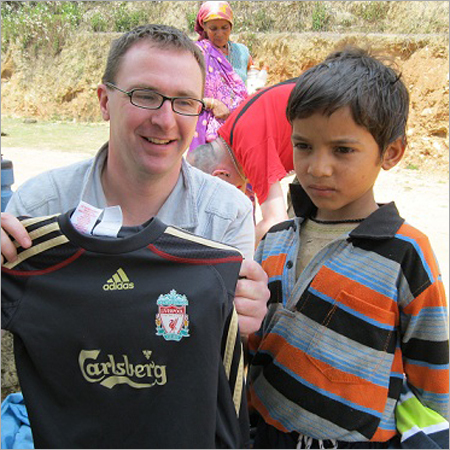 Scot Uk Donating Cloths To Poor Family Person