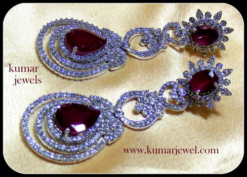 DESIGNER COSTUME EARRINGS.