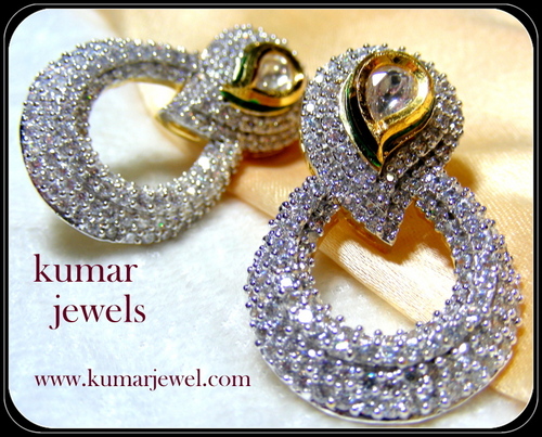 Diamond circle earring.