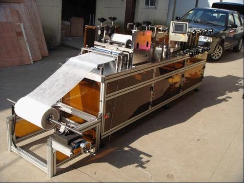 non woven shoe cover making machine