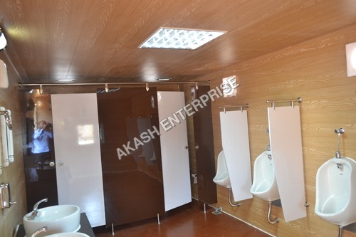 Brown And White Cubicle Bathroom