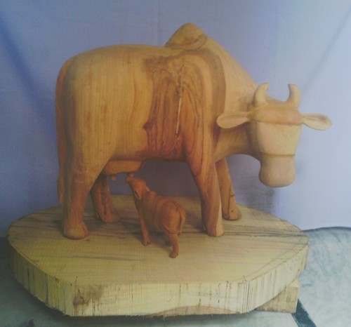 Wooden cow statue