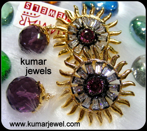 SUN STYLE EARRING.