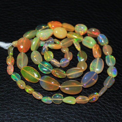 Ethiopian Opal Smooth Oval - 16 Inch Strand, 5-14mm, Golden Hue, Polished Natural Opal