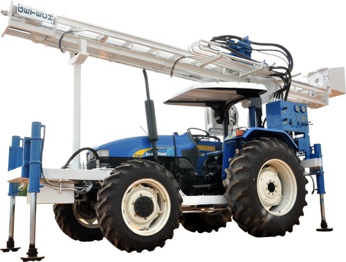 TRACTOR MOUNTED DRILLING RIG