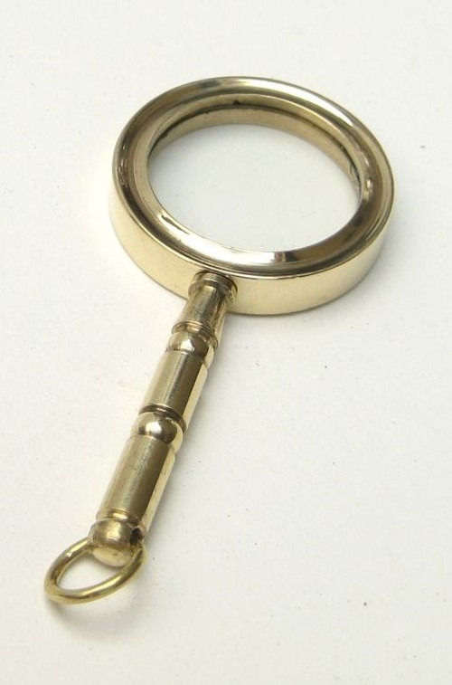 Miniature brass magnifying glass