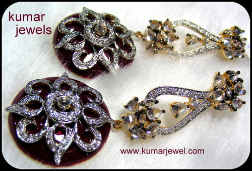 Stunning enamel earring.